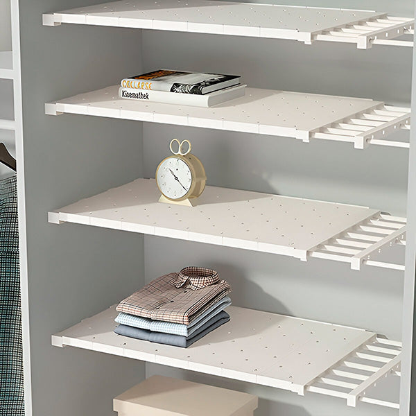 Étagère extensible pour maximiser le gain de place dans les armoires de cuisine ou salle de bain. Stockage maison.