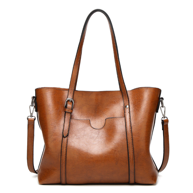Sac à main femme élégant en cuir synthétique, polyvalent pour le quotidien.