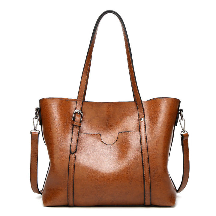 Sac à main femme élégant en cuir synthétique, polyvalent pour le quotidien.