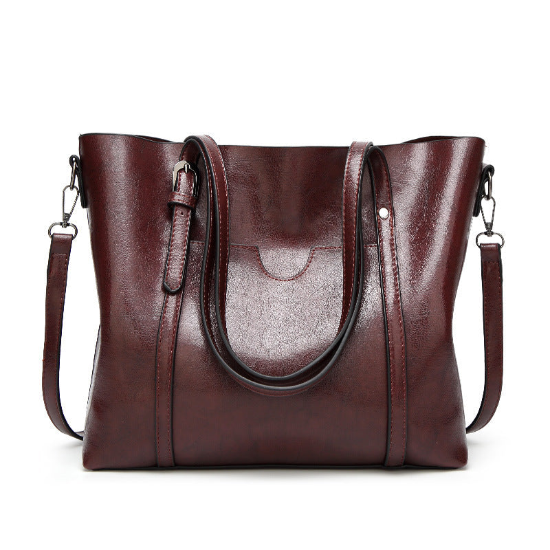 Sac chic féminin avec détails dorés, idéal pour compléter toutes les tenues avec style.