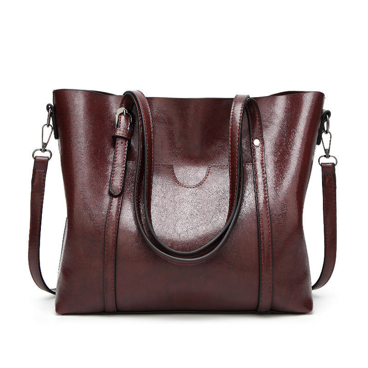 Sac chic féminin avec détails dorés, idéal pour compléter toutes les tenues avec style.