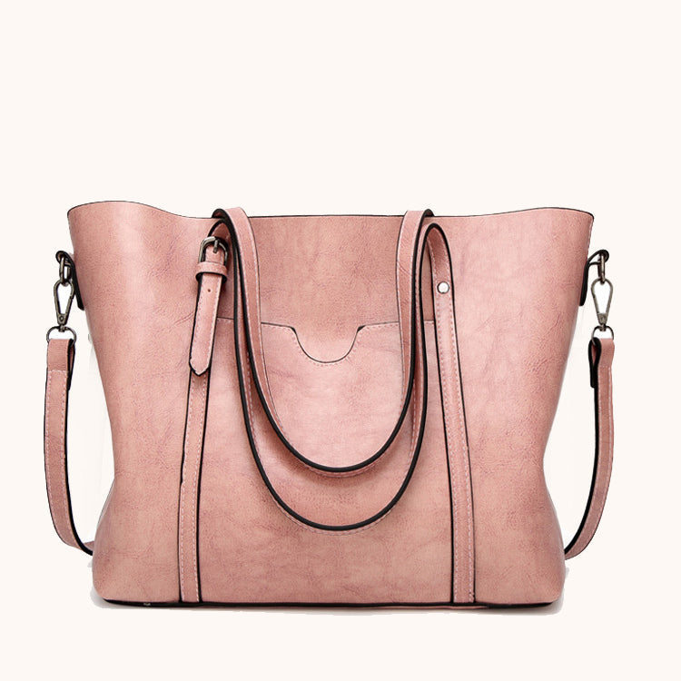 Sac à main pour femme, accessoire de mode en cuir synthétique, style intemporel et moderne.