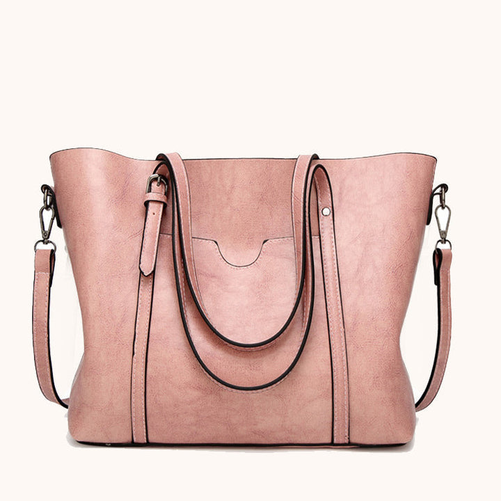 Sac à main pour femme, accessoire de mode en cuir synthétique, style intemporel et moderne.