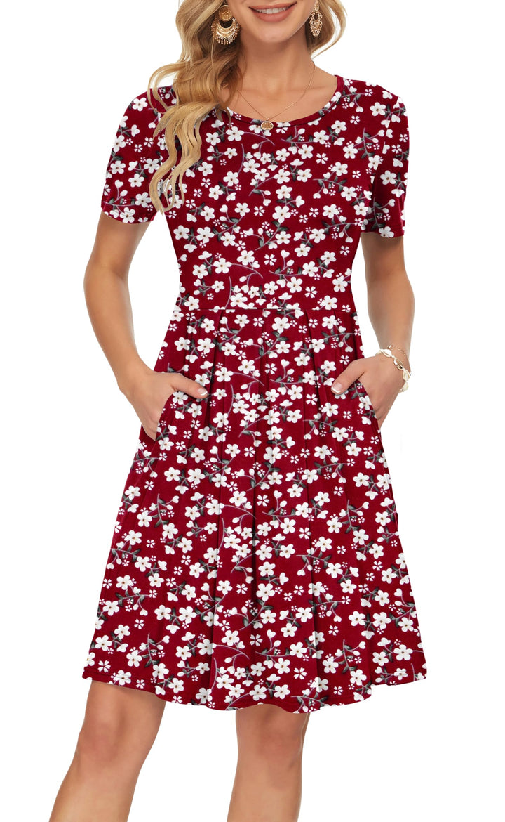 Robe femme Sylphine plissée, manches courtes, poches discrètes, style décontracté et moderne.
