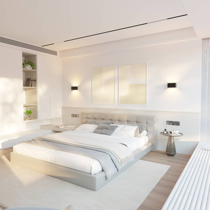 Éclairage mural extérieur LED blanc chaud, design moderne et réglable pour terrasse et allée.