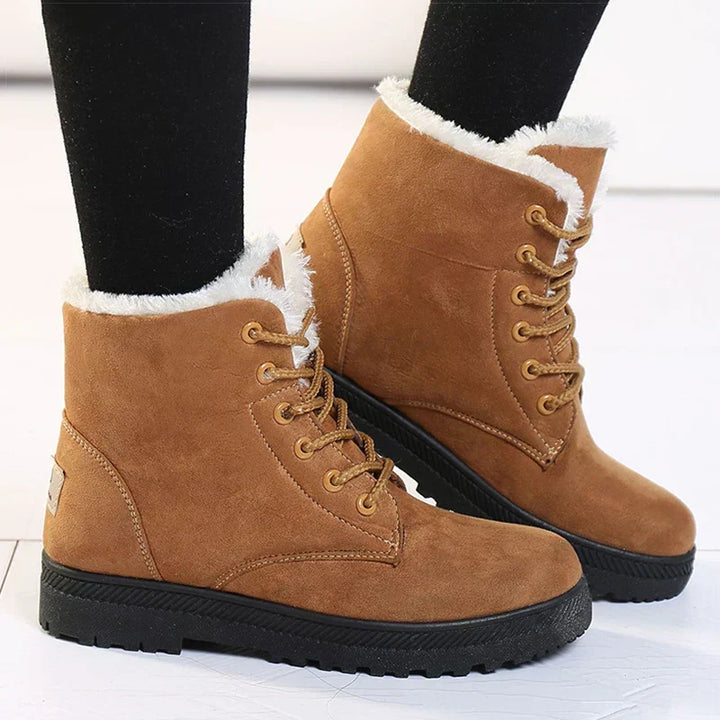 Bottes d'hiver chaudes et déperlantes pour femmes. Bottines confortables à lacets, idéales pour affronter le froid.