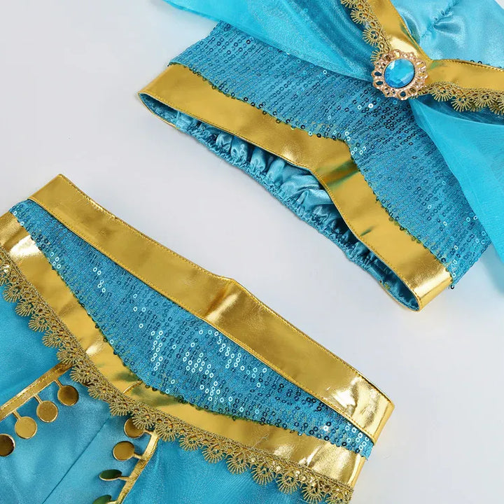 Déguisement Princesse Jasmine pour enfant fille lors d'un carnaval. Costume oriental bleu magique pour un événement festif.