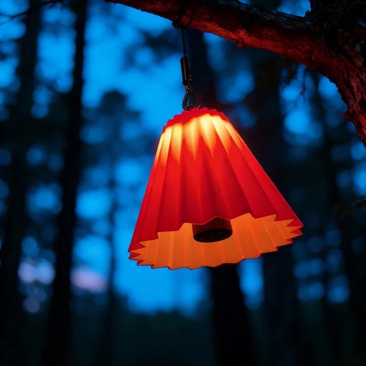 Abat-jour de lanterne en silicone pliable, crée une lumière d'ambiance douce pour l'éclairage extérieur.