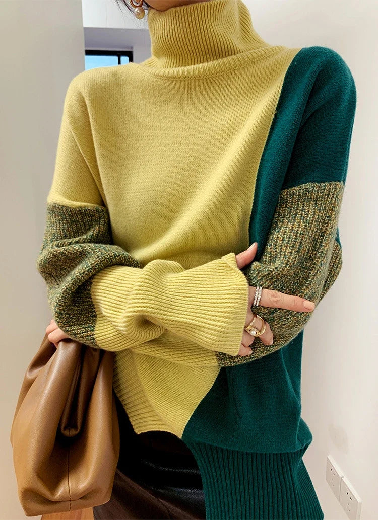 Chandail élégant pour femme, coupe ample et col haut contrasté, parfait pour un look hivernal stylé.