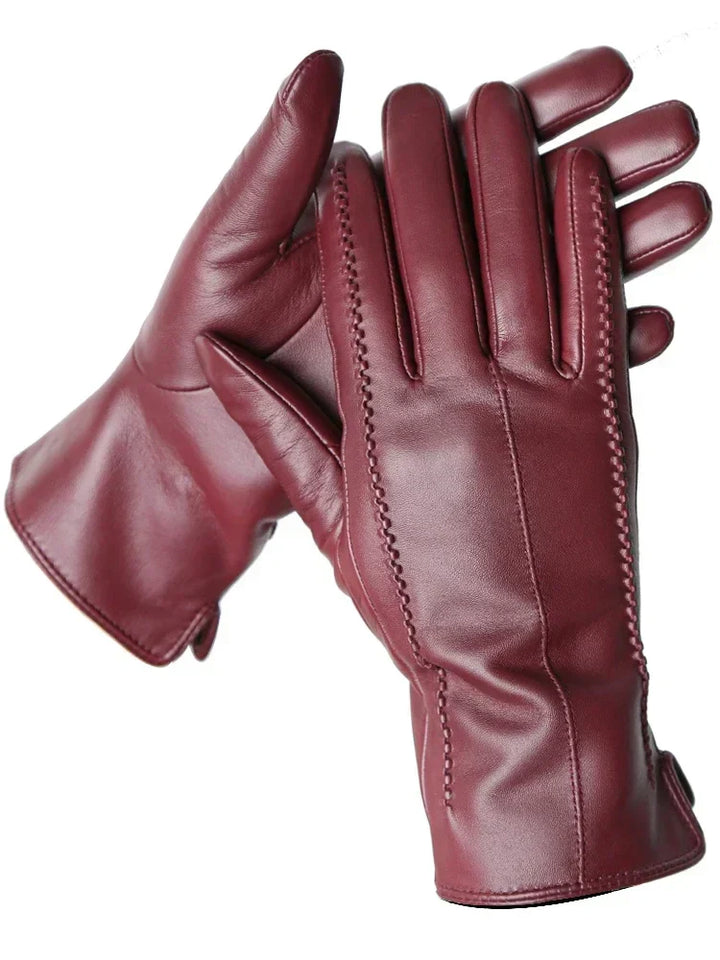 Gants d'hiver femme en cuir noir, luxe et confort avec doublure chaude. Parfaits pour les journées froides.