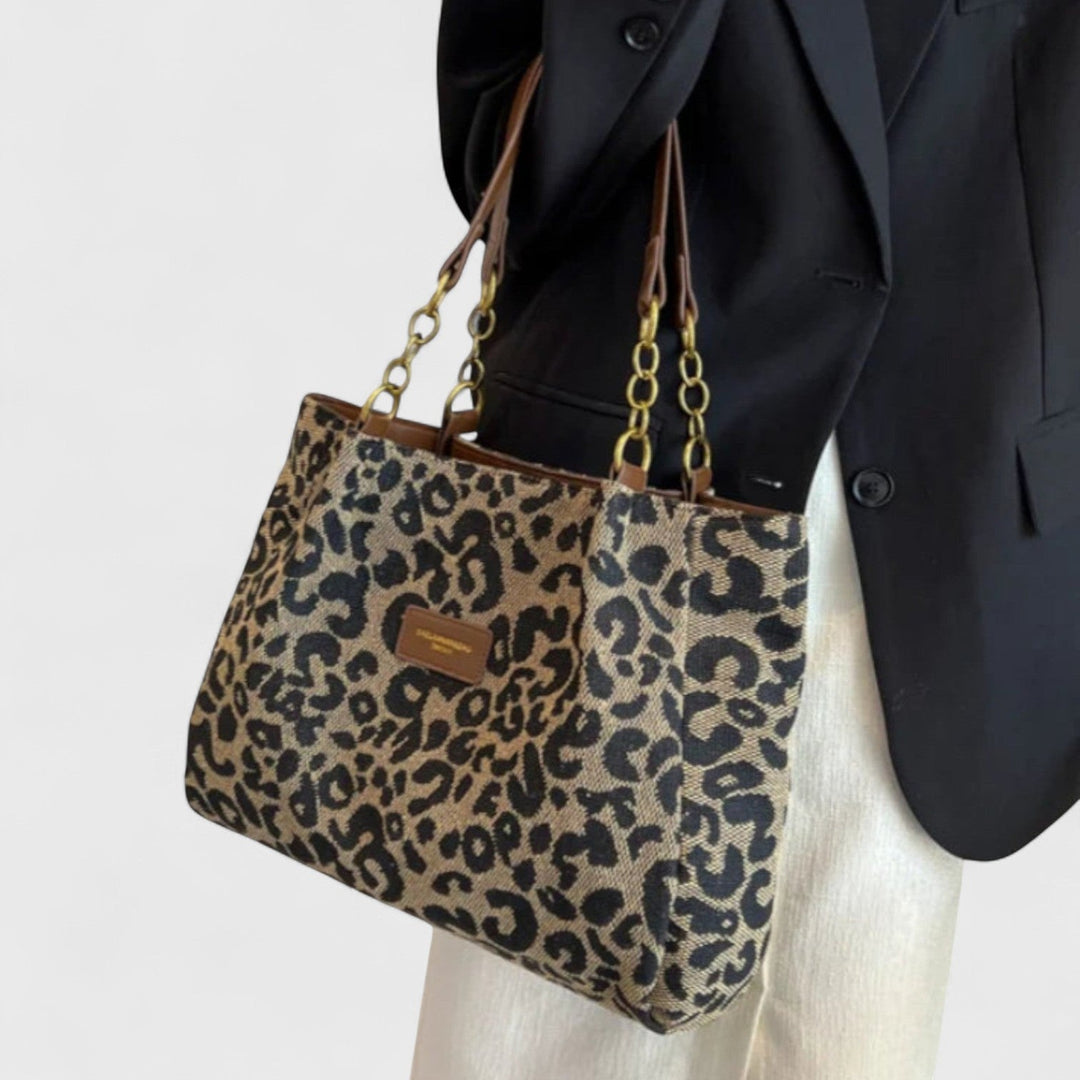Sac shopping femme en toile léopard marron avec bandoulière réglable, grand format élégant.