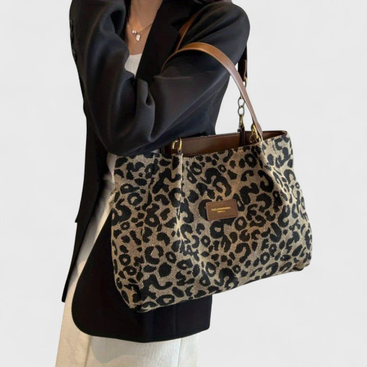 Sac shopping femme mode en toile léopard marron, grand format polyvalent avec bandoulière pour élégance.