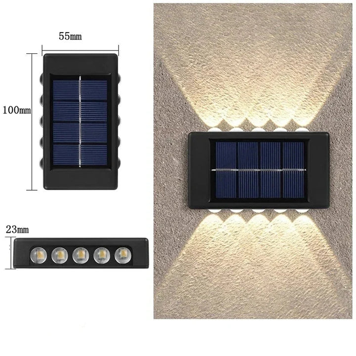 Applique murale solaire LED bidirectionnelle, design compact et étanche, parfaite pour éclairer tout type de jardin moderne.