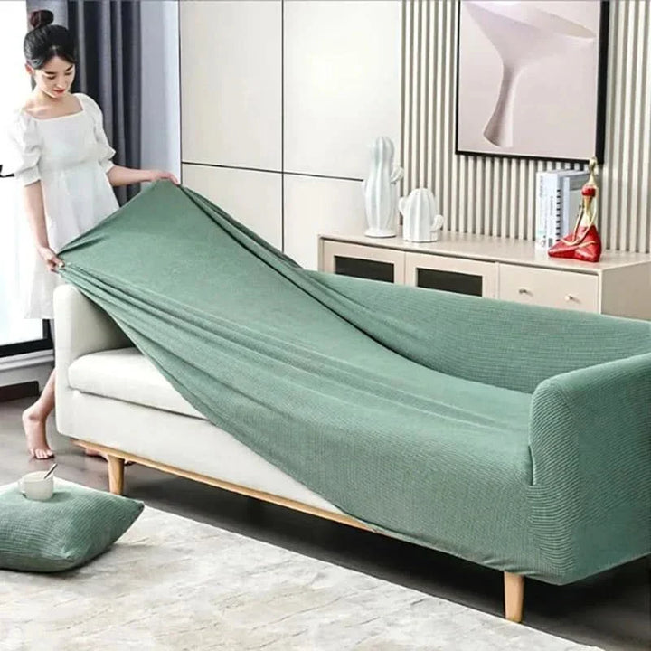 Housse de canapé lavable COUCHWRAP, protection antidérapante en jacquard pour un salon propre et protégé des taches.