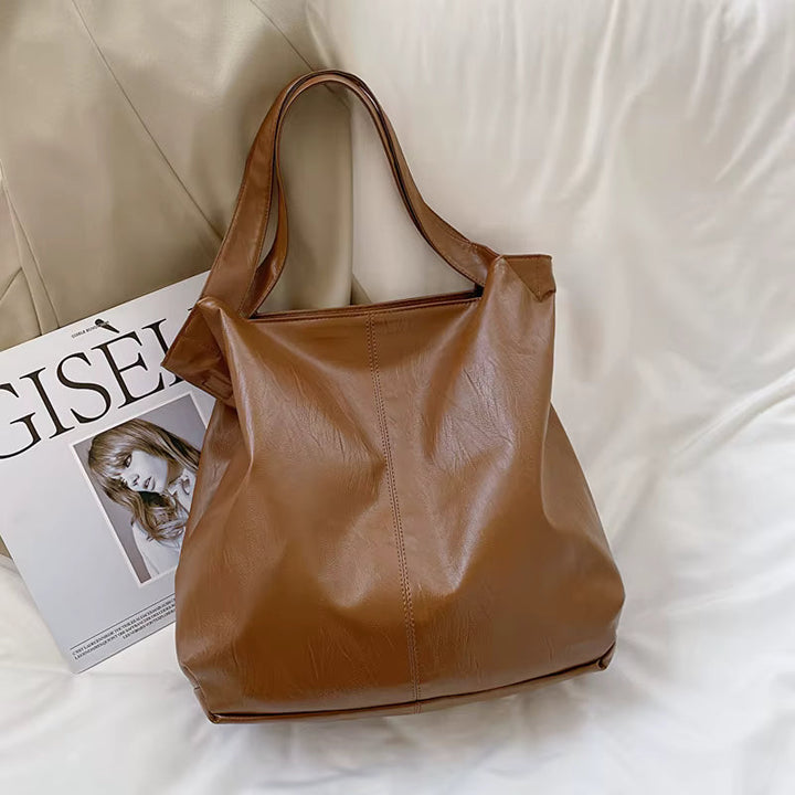 Sac cabas bandoulière femme en cuir vegan, grand et élégant, parfait pour le quotidien.