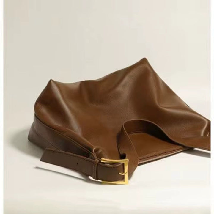 Sac cabas quotidien en cuir vegan noir, avec fermeture éclair pour plus de sécurité. Spacieux et élégant.