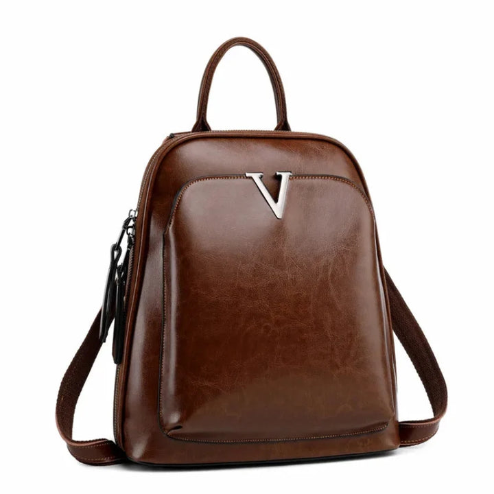 Sac à dos femme Alba en cuir verni noir, élégant et chic, parfait pour le quotidien et la maroquinerie tendance.