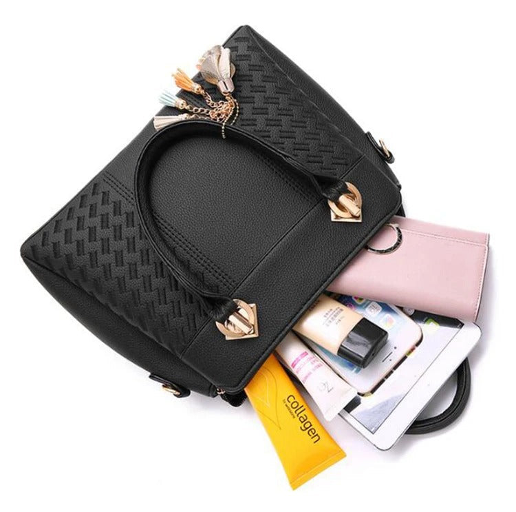Sac à main luxe femme, finitions dorées, bandoulière amovible, accessoire polyvalent et chic.