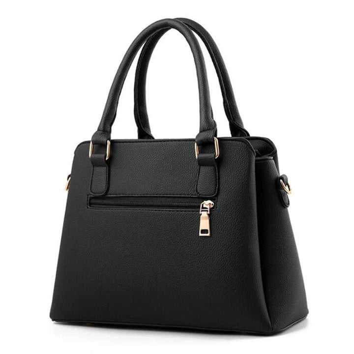Sac à main bandoulière pour femmes, design épuré, luxe discret, parfait pour toute occasion élégante.