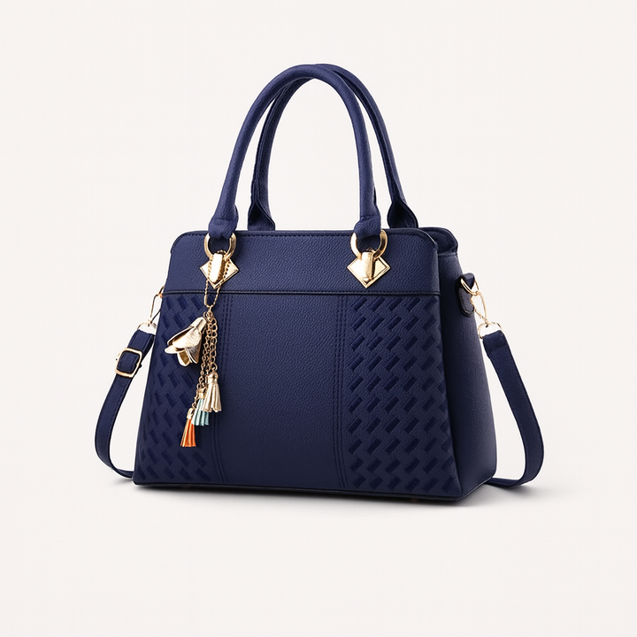 Sac bandoulière luxe femme noir, cuir grainé élégant, porté épaule ou croisé pour un look chic.