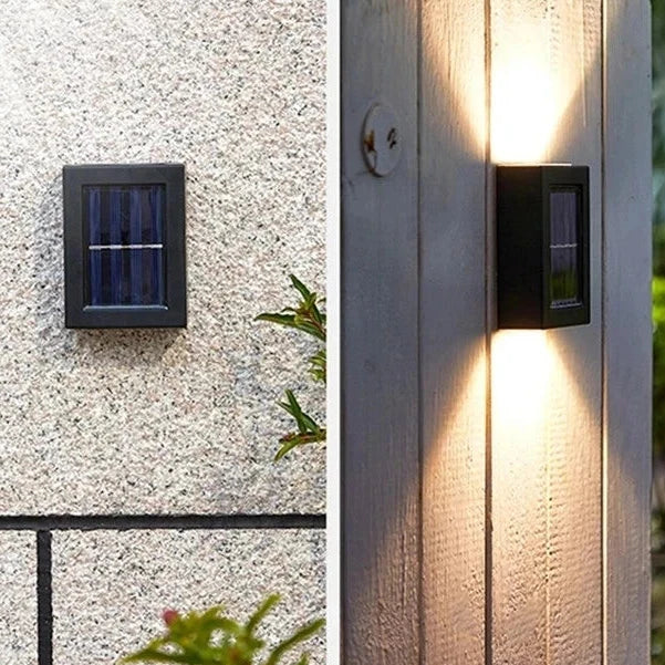 Applique murale solaire LED autonome, design moderne et éclairage bidirectionnel pour une ambiance chaleureuse en extérieur.