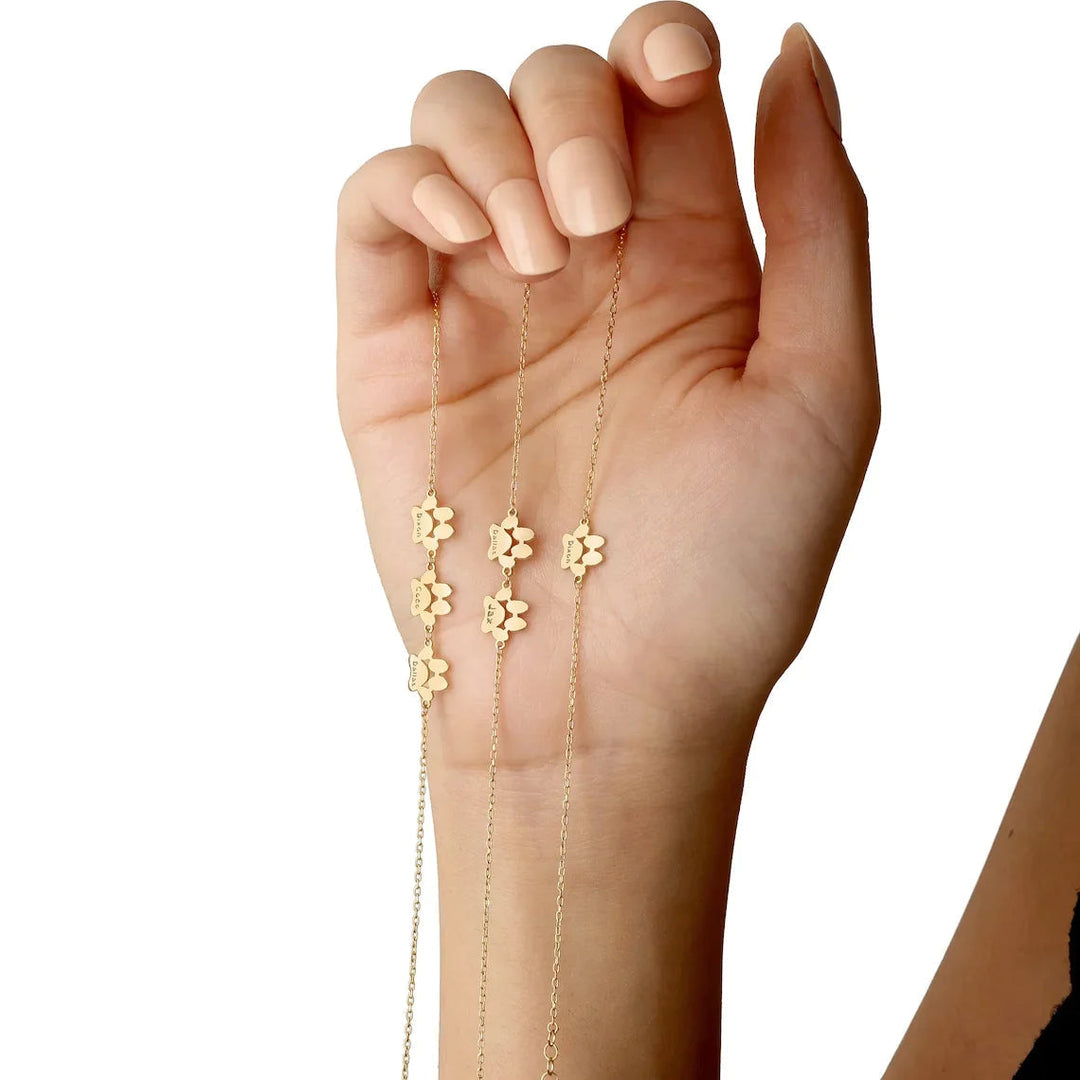 Élégant bracelet personnalisé avec l'empreinte de patte, un bijou significatif pour l'amour éternel des animaux de compagnie.