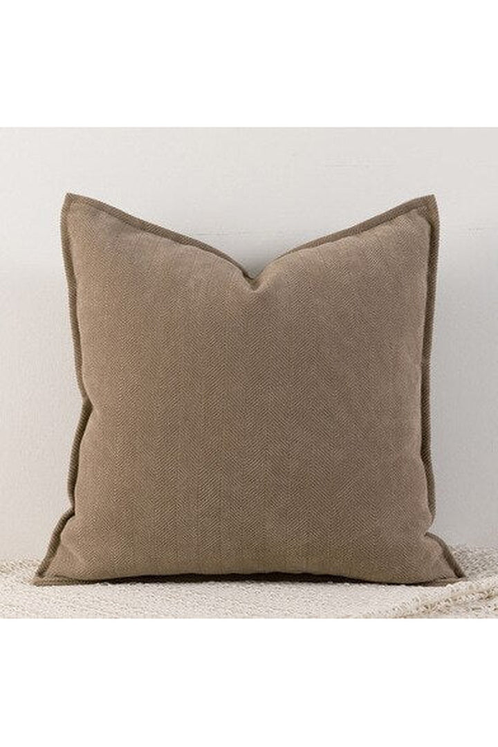 Housse de coussin élégante pour salon chic et confortable, design intemporel.