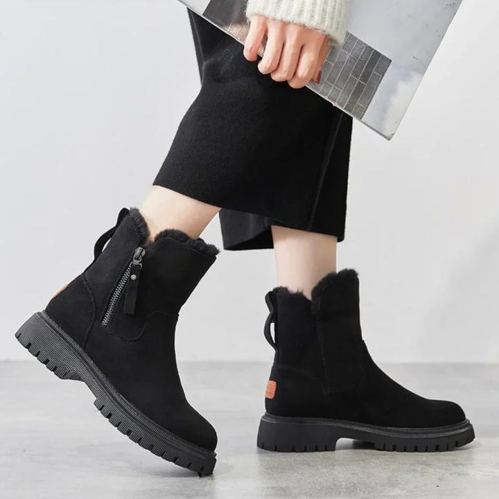 Bottes femme hiver, chaudes et élégantes, idéales pour la neige. Confort et protection antidérapante assurés.