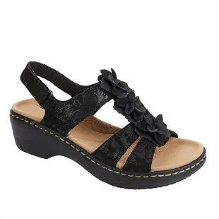 Paire de sandales femme, confortables et orthopédiques, idéales pour un look bohème décontracté.