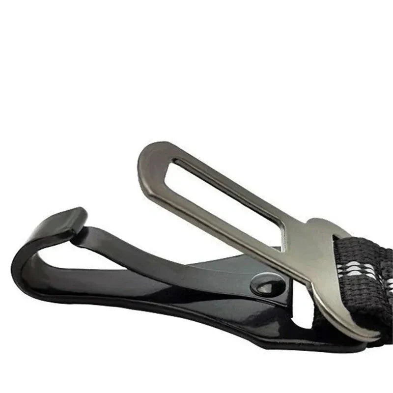 Accessoire 3-en-1 pour chien : ceinture de sécurité, harnais et sangle de retenue pour voiture et voyage.