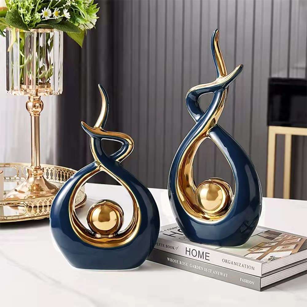Figurine céramique abstraite moderne, boule dorée, décoration intérieure design pour salon.