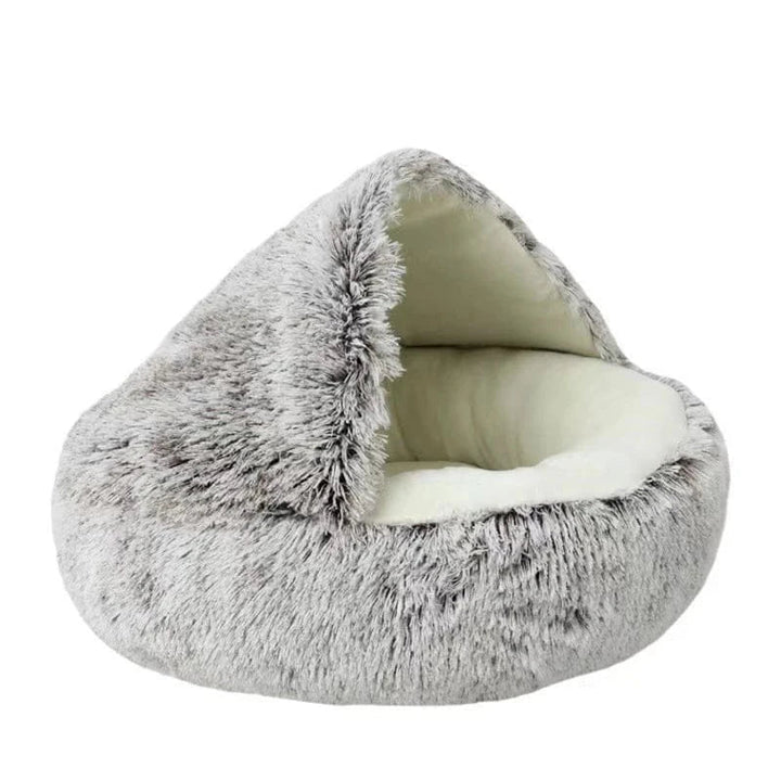 Panier chauffant de luxe pour chat et petit chien, offrant un confort optimal et un couchage moelleux pour la détente.