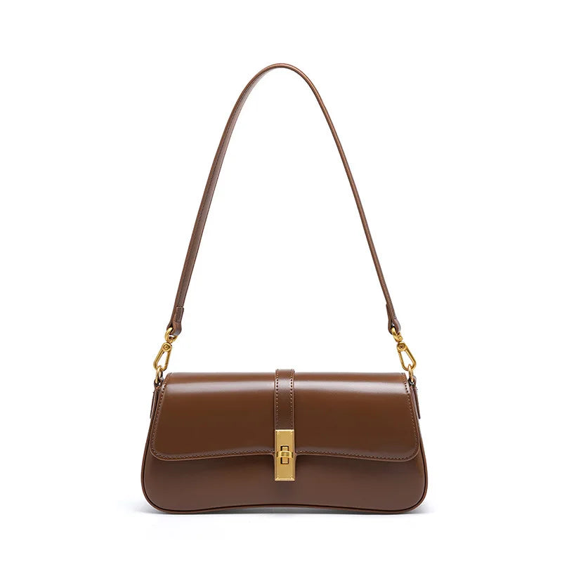 Petit sac à main noir pour femme, style chic et raffiné en cuir, idéal pour le quotidien.
