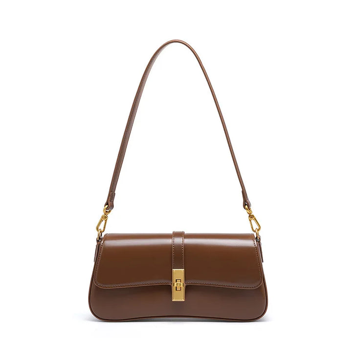 Petit sac à main noir pour femme, style chic et raffiné en cuir, idéal pour le quotidien.
