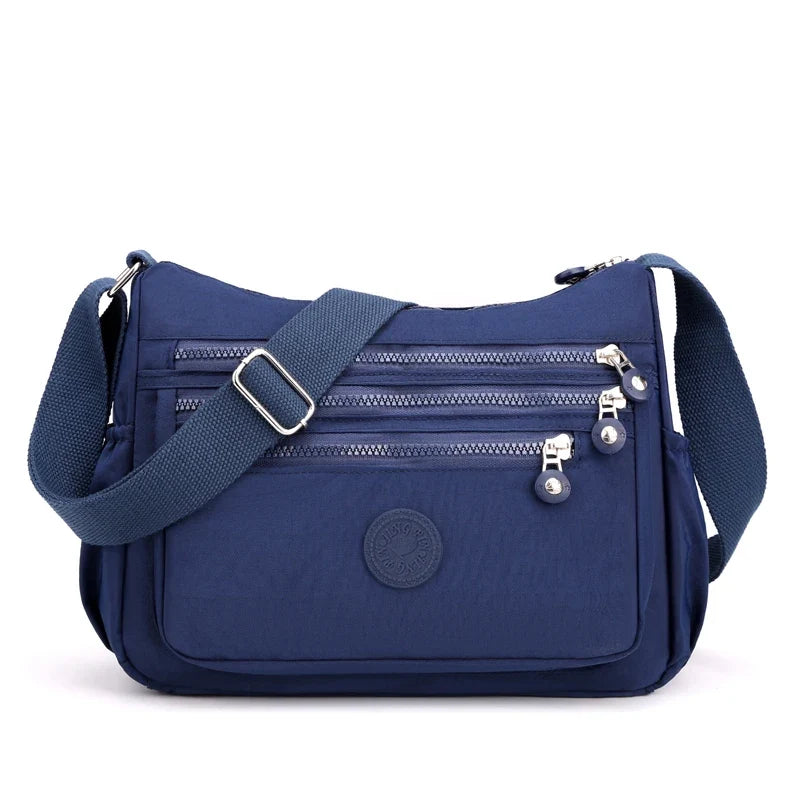 Sac bandoulière nylon multifonction pour femme, léger et élégant, idéal pour le quotidien.