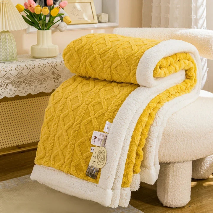 Confort thermique optimal avec cette couverture polaire sherpa ultra douce et chaude pour toute la famille.