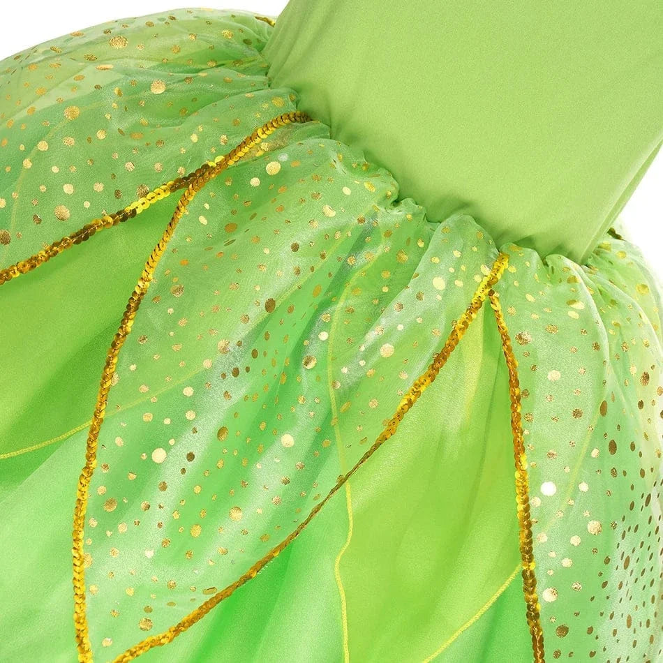 Ensemble déguisement Fée Clochette pour enfant, incluant robe verte scintillante et ailes féeriques. Idéal pour un carnaval.