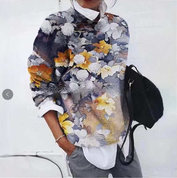 Pull femme ultra confortable et chaud, orné d'un motif floral et touches tigre vibrant pour l'hiver.