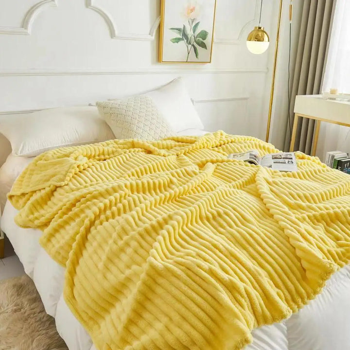 Plaid confortable LuxeCocoon, parfait pour la décoration de chambre cosy et chaleureuse.