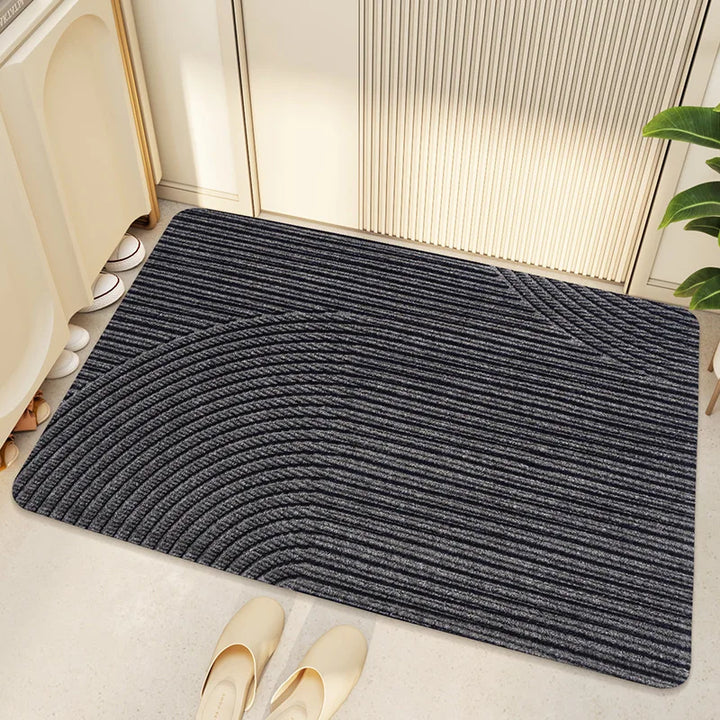 Tapis de porte PureStep en PVC, motif géométrique, robuste et anti-saleté pour une entrée de maison impeccable.