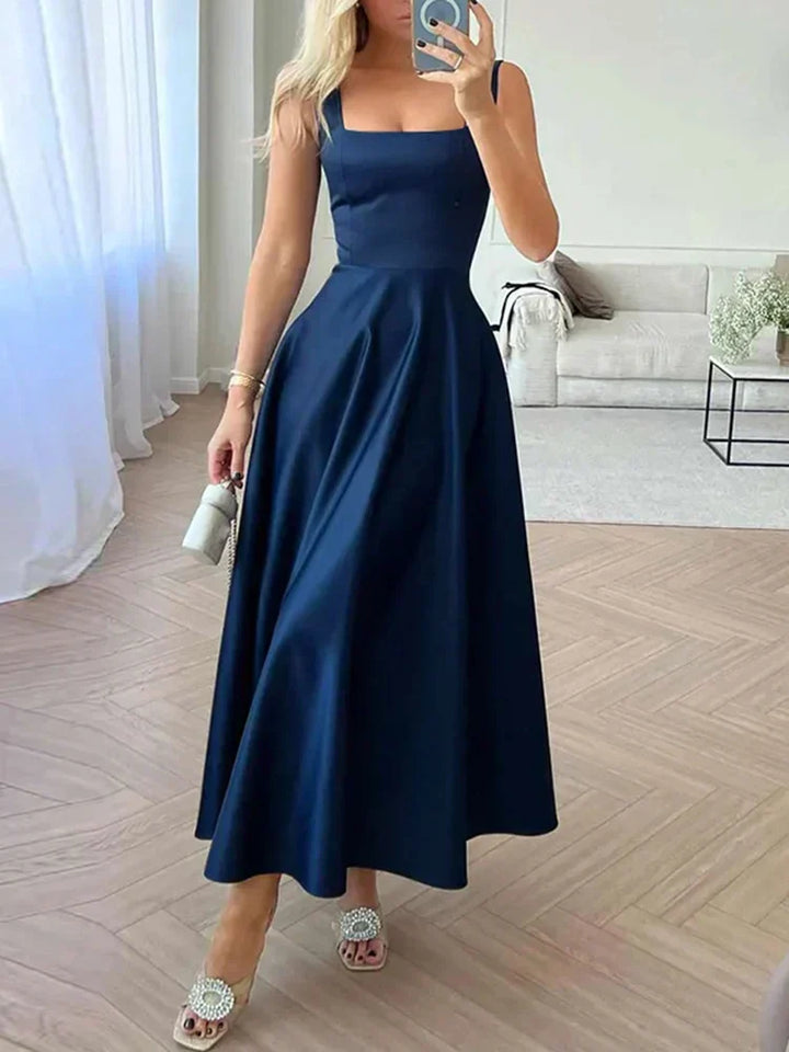 Robe de soirée évasée pour femme, design chic et intemporel. Robe longue adaptée aux cérémonies et événements spéciaux.