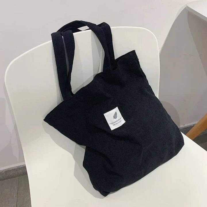 Sac cabas femme en velours côtelé, design élégant et durable. Idéal pour l'épaule, accessoire tendance.