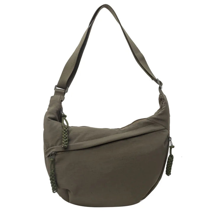 Sac banane femme tendance, format oversize en tissu déperlant, confort optimal et ajusté.