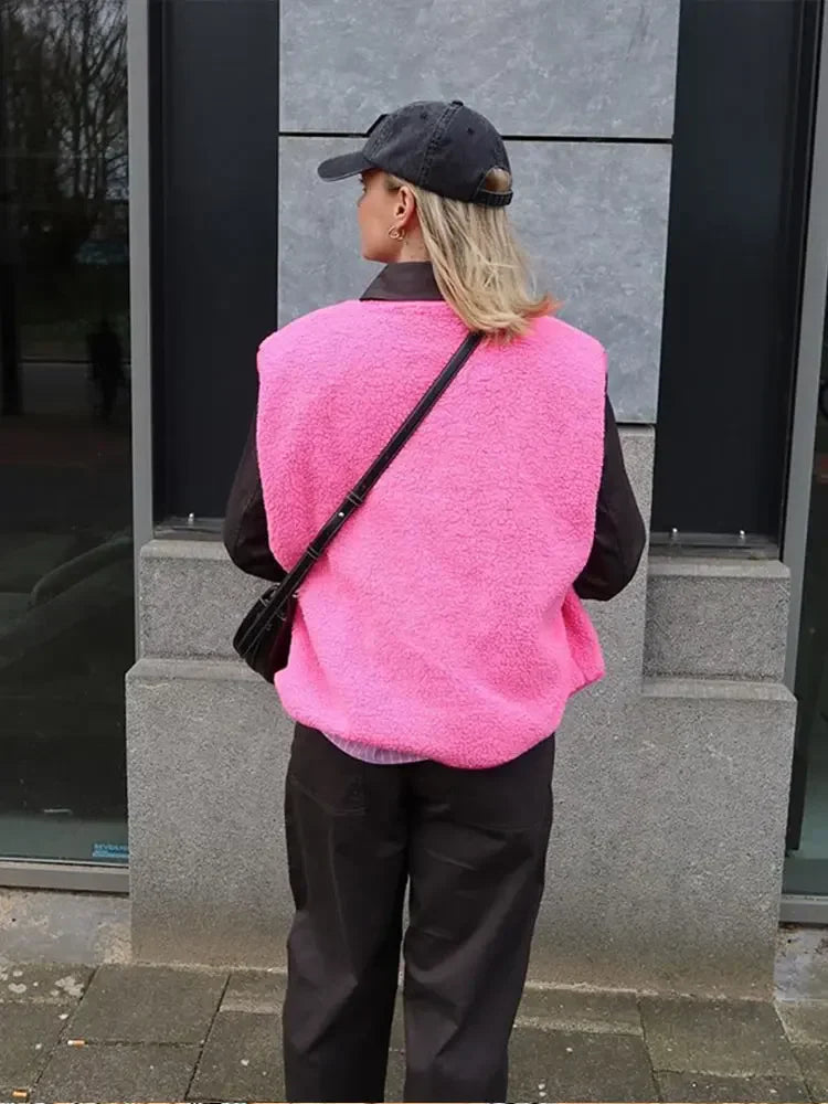 Gilet chaud décontracté pour femmes, col en V. Confortable et polyvalent, parfait pour un look chic ou décontracté.