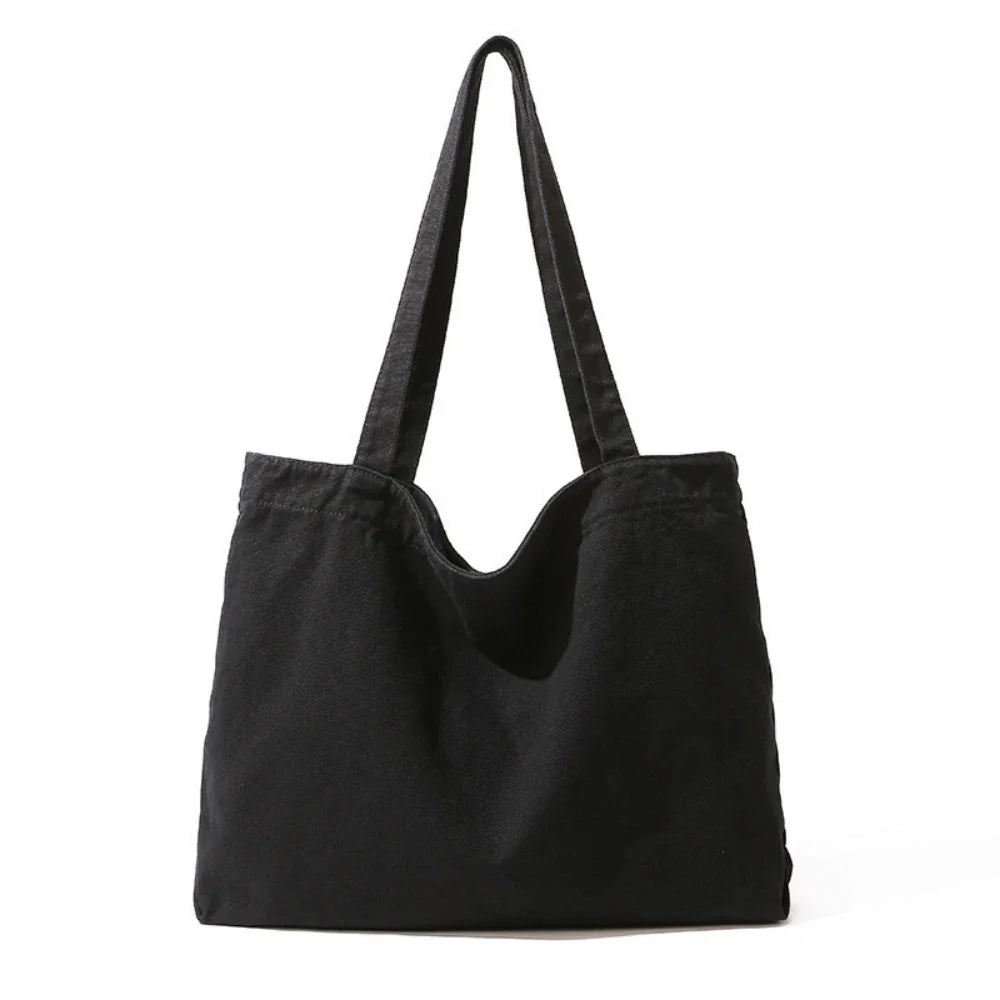 Sac cabas en coton au design minimaliste et spacieux. Accessoire mode femme élégant pour toutes occasions.