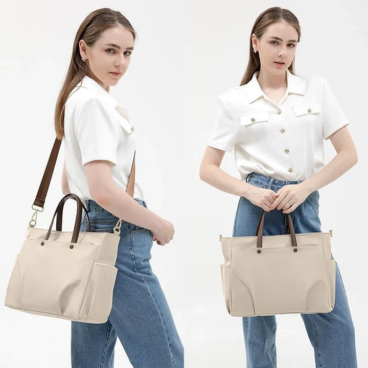 Élégant sac bandoulière femme noir, grand format. En nylon, parfait pour la mode, les cours et le transport quotidien.