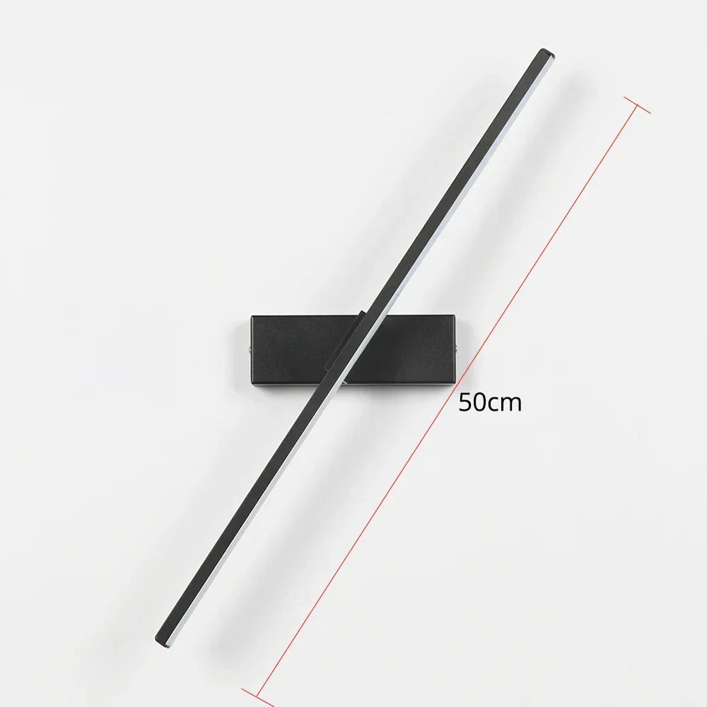Applique murale LED AuroLite orientable 330°, idéale comme liseuse de chevet moderne pour chambre ou salon.