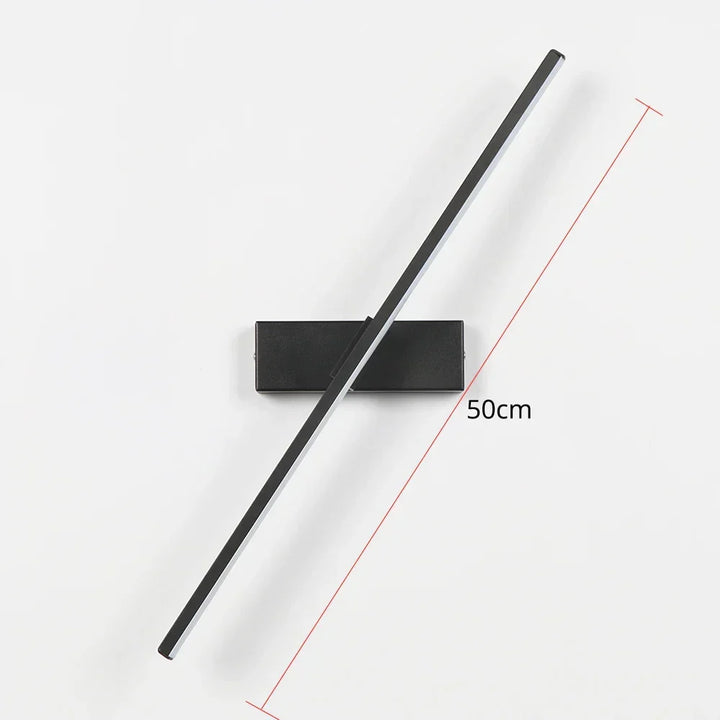 Applique murale LED AuroLite orientable 330°, idéale comme liseuse de chevet moderne pour chambre ou salon.