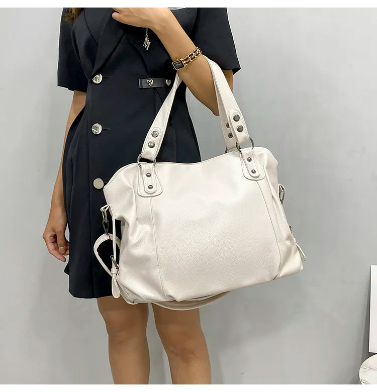 Sac fourre-tout polyvalent pour femme, parfait comme sac de cours, sac étudiant ou professionnel.