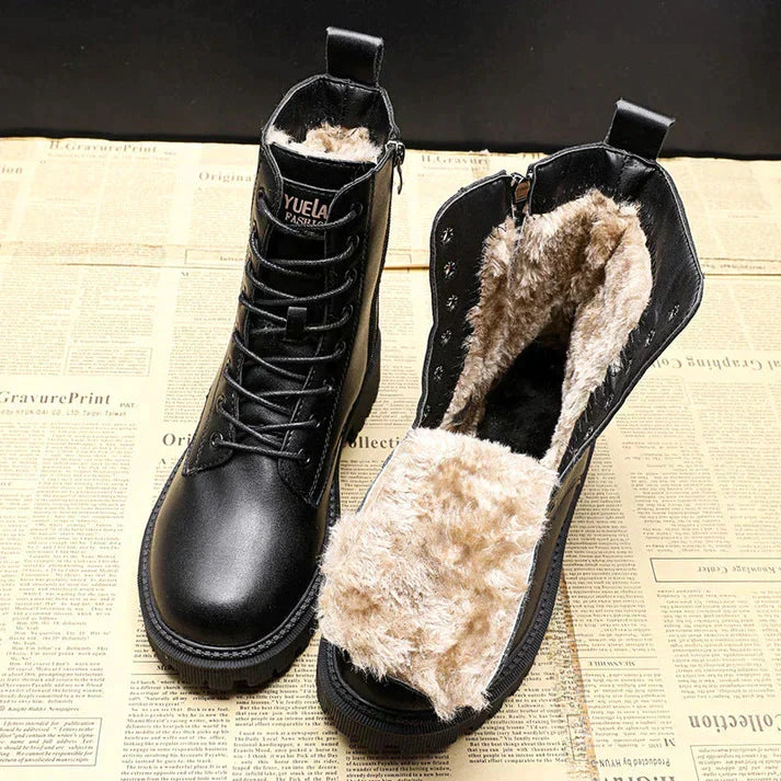 Bottes d'hiver en cuir noires Nicola pour femmes, élégantes et chaudes, parfaites pour la mode hivernale.